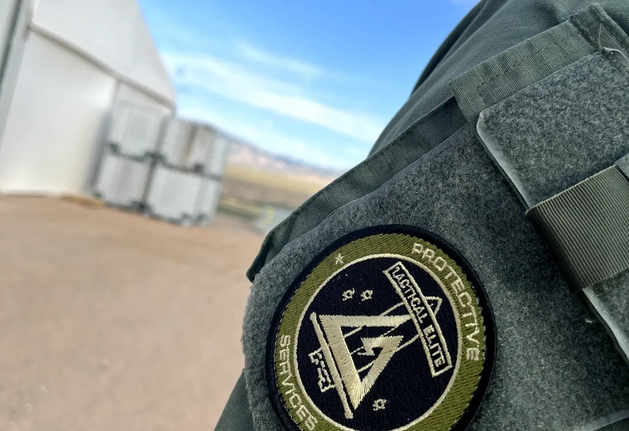 Tactical Elite Protective Services shoulder patch on an officer's uniform